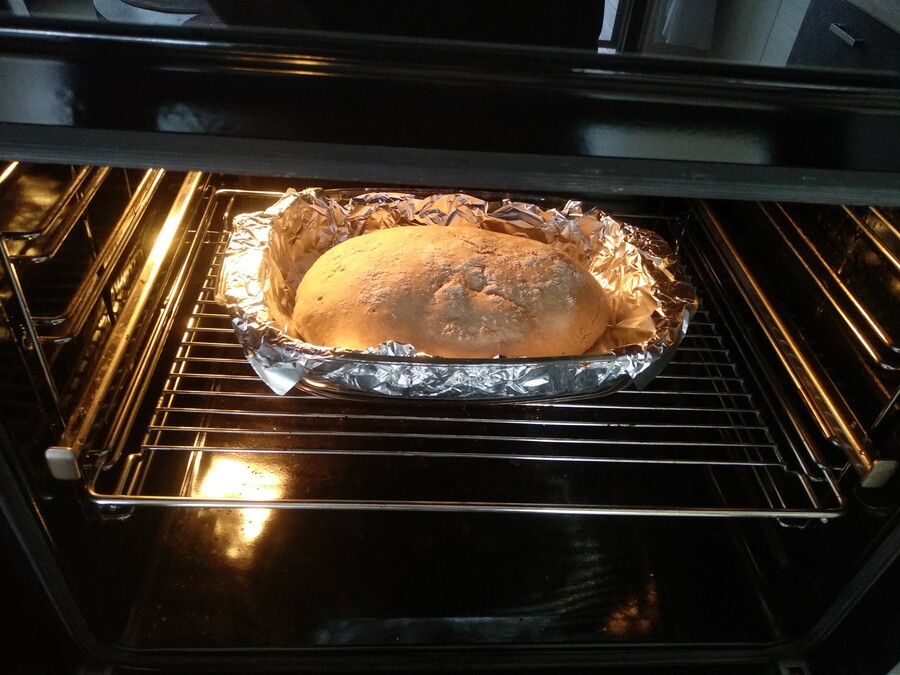 Half-baked bread inside an oven
